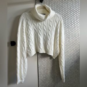 Cropped cream cable knit sweater. Perfect for office or casual.